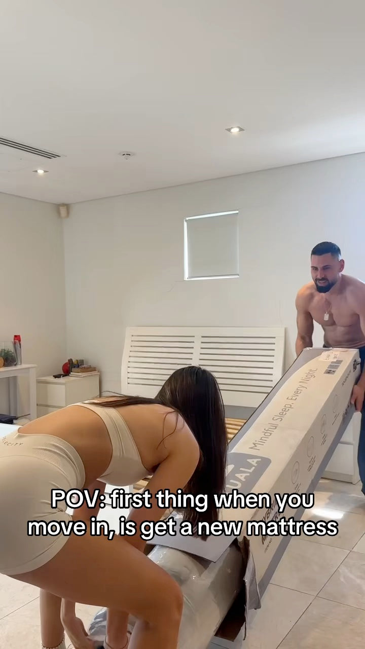 Chris Keverian unboxing a Tuala mattress on move-in day